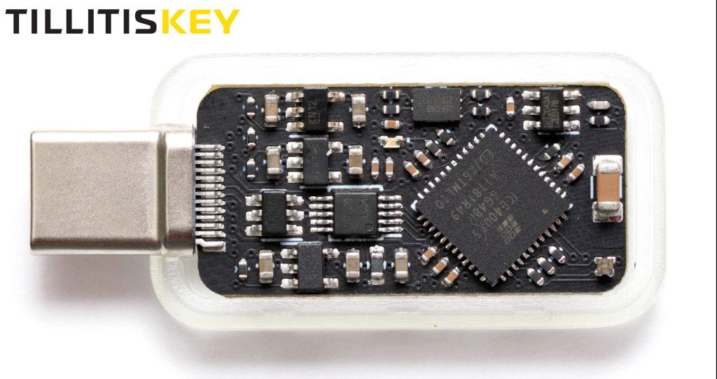 TILLITIS KEY: Transparent USB-C security key showing the internal circuit board and components.