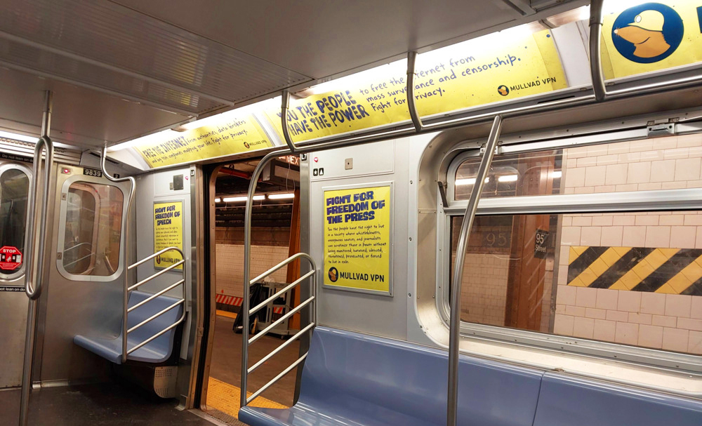 Mullvad VPN subway ads: YOU THE PEOPLE HAVE THE POWER to free the internet from mass surveillance and censorship. Fight for privacy.
